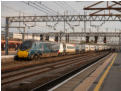 Late afternoon at Crewe - Pendolino 390 013 arrives with 1710 to Piccadilly...