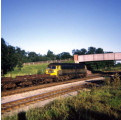 A southbound freight hauled by a green 47, Pilmoor