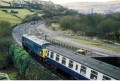 An eastbound train leaves the tunnel...